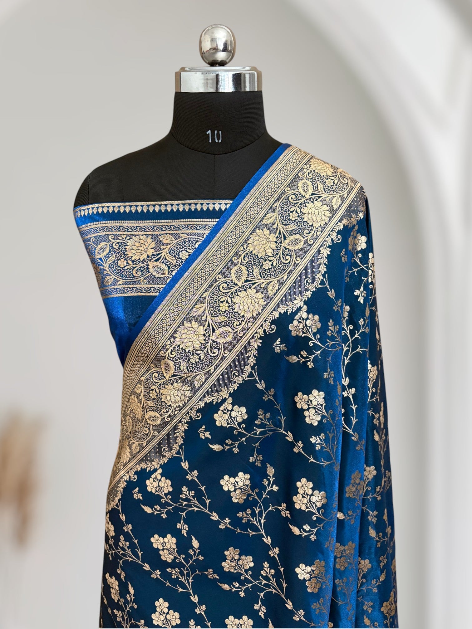 Teal Blue Satin Silk Banarasi Saree – Golden Zari Floral Jaal