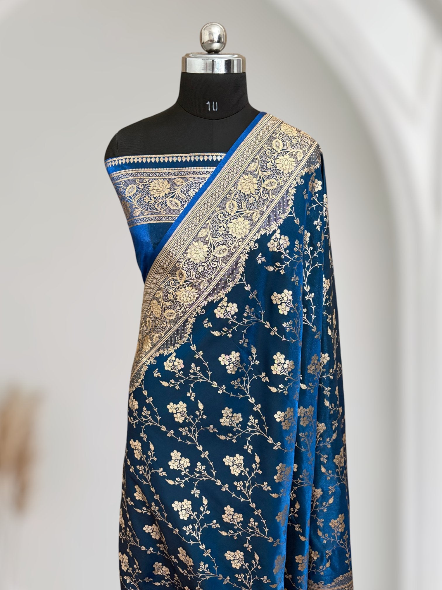 Teal Blue Satin Silk Banarasi Saree – Golden Zari Floral Jaal